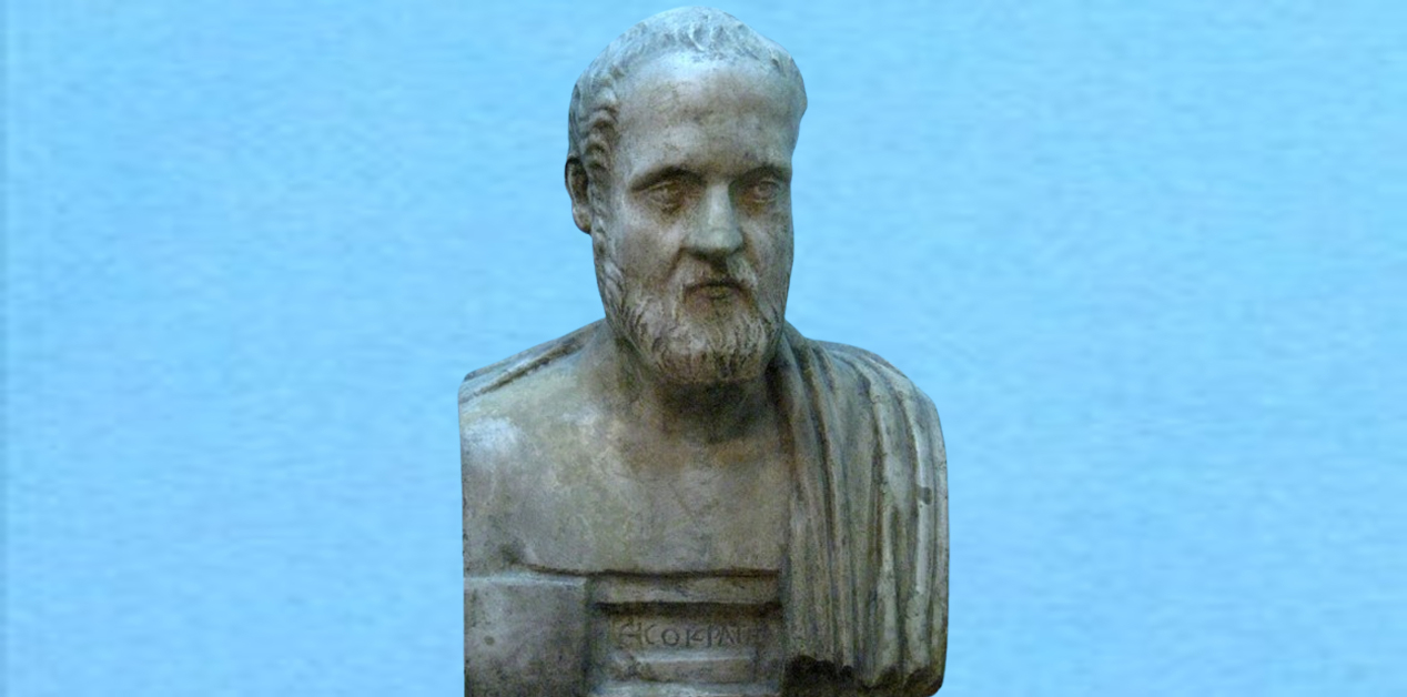 Ισοκράτης: Ρωμαϊκή προτομή του αρχαίου ρήτορα Ισοκράτη με γενειάδα και μανδύα, σε μπλε φόντο.