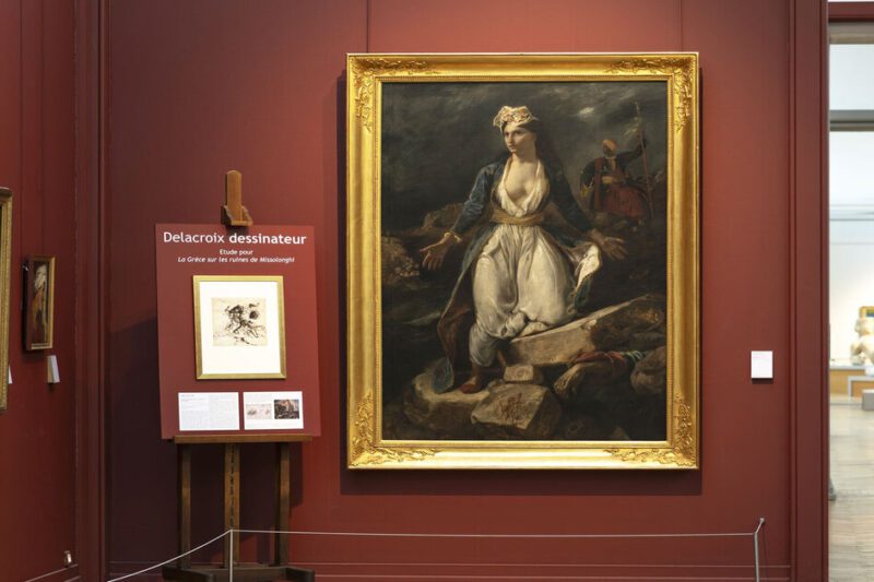 Μετά από δύο αιώνες, το παγκόσμιο σύμβολο του Φιλελληνισμού εγκαταλείπει το Μπορντό για να τιμήσει την Ιερή Πόλη. Ο πίνακας «Η Ελλάδα στα ερείπια του Μεσολογγίου» θα εκτεθεί στο Ξενοκράτειο Μουσείο, σε μια ιστορική στιγμή γεμάτη συμβολισμούς. Η γυναικεία μορφή που συγκλόνισε την Ευρώπη του 19ου αιώνα, έρχεται να μας υπενθυμίσει τη διαχρονική αξία της ελευθερίας και τη φρίκη του πολέμου. Μια σπάνια ευκαιρία να δούμε από κοντά το έργο που έγινε η «φωνή» των αγωνιστών του 1826.